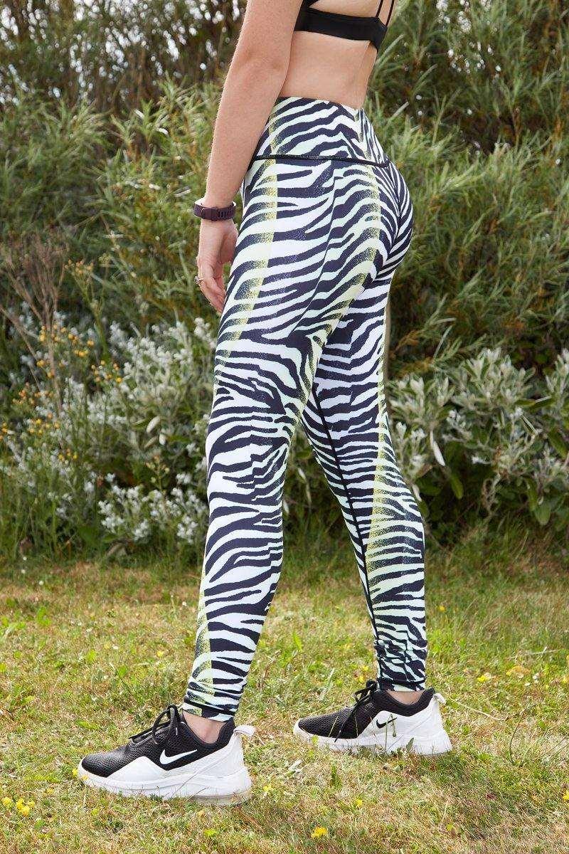 https://www.wattsthattrend.com/cdn/shop/products/zebra-print-sports-leggings-watts-that-trend-4.jpg?v=1656285240